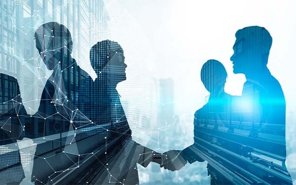 Silhouette view of business people team in group meeting with building in background and with connecting lines superimposed